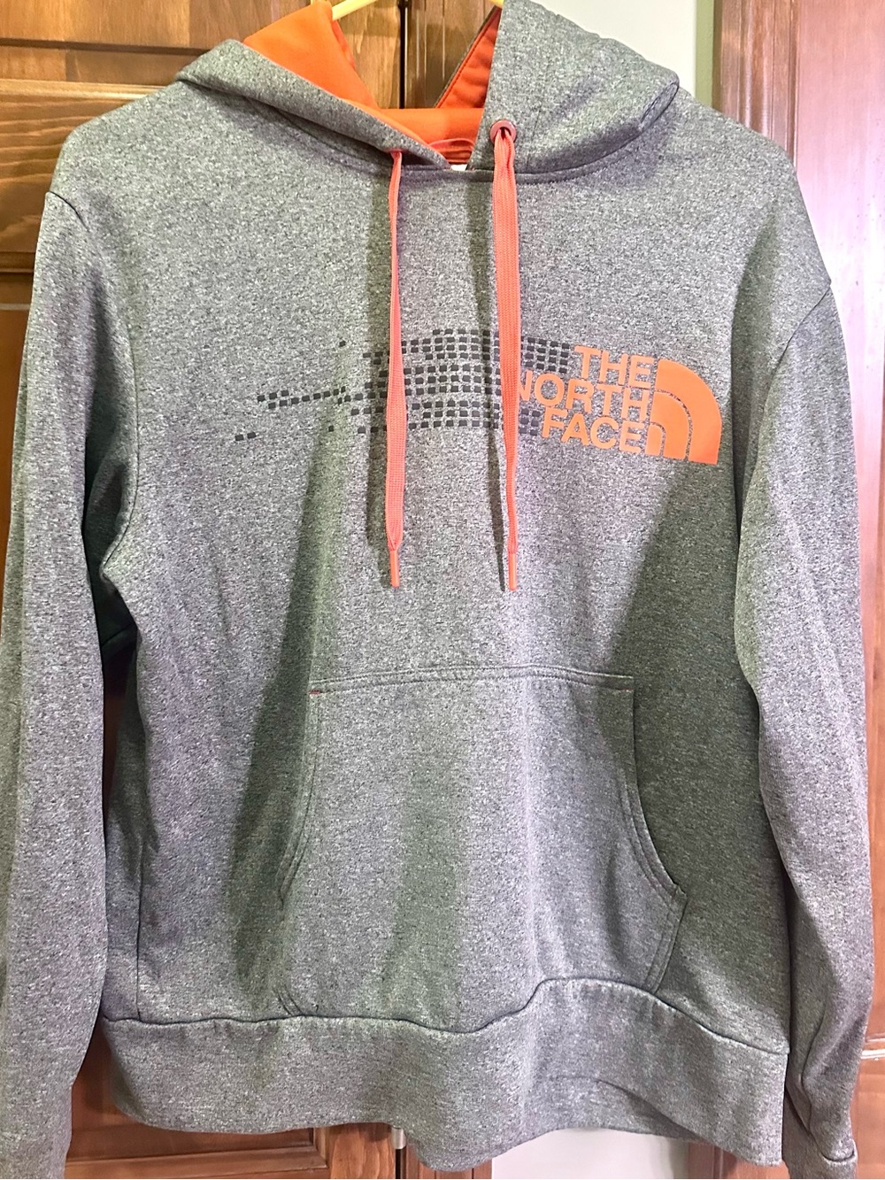 The North Face Men's Gray Hoodie with Orange Logo & Drawstring